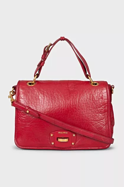 Leather bag with gold clasp