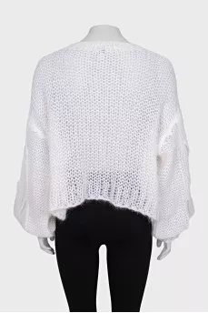 Knitted sweater with a raised logo