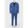 Male suit in a small cage