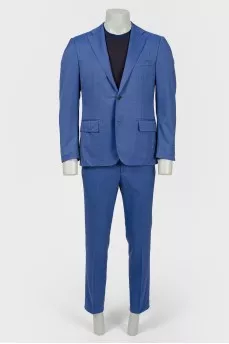 Male suit in a small cage