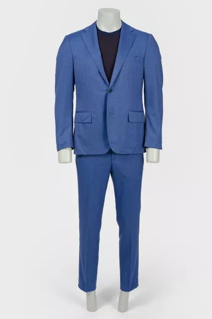 Male suit in a small cage