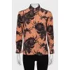 Помаранчева блузка в квітковий принт