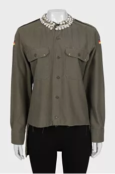 Asymmetrical shirt decorated with crystals