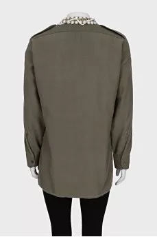 Asymmetrical shirt decorated with crystals