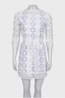 Transparent dress decorated with embroidery