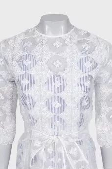 Transparent dress decorated with embroidery