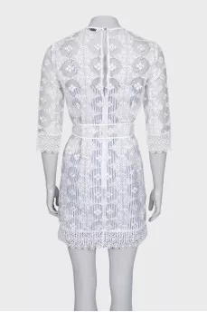 Transparent dress decorated with embroidery