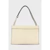 Yellow leather bag with tag