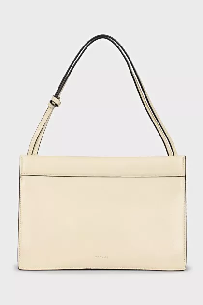 Yellow leather bag with tag
