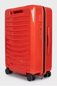Red plastic suitcase