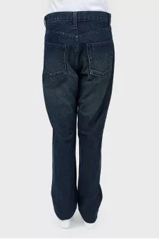 Jeans with scuffs and rhinestones