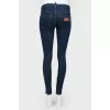Skinny jeans below lightning