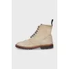 Beige boots with perforations