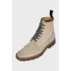 Beige boots with perforations