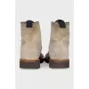 Beige boots with perforations