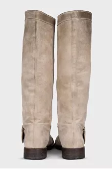Gray boots decorated with a strap