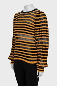 Striped jumper with back fastening