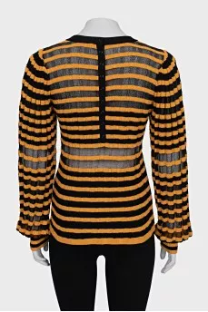 Striped jumper with back fastening