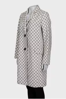 Straight-cut coat with a polka dot print