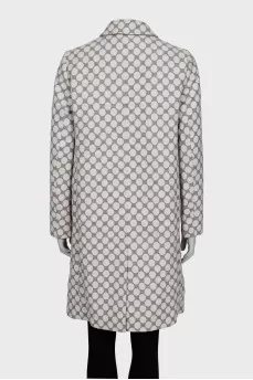Straight-cut coat with a polka dot print