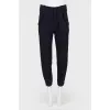 Slim fit trousers with patch pockets
