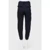 Slim fit trousers with patch pockets