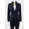 The jacket is elongated satin
