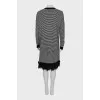 Striped dress decorated with a brooch