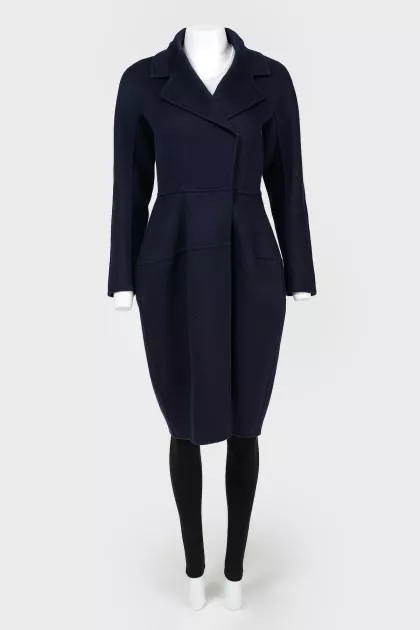 The coat is fitted