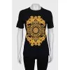 Black T-shirt with a floral print