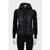 Black zip-up jacket with a hood