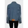 Denim jacket with embroidery on the sleeves