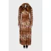 Leather coat with a fur collar