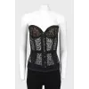 Lace corset on hooks