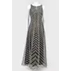 Floor-length gray dress with black lining