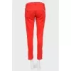 Low waist trousers with decorative zips