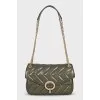 Leather crossbody bag with tag