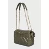 Leather crossbody bag with tag