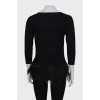 Wool jumper with feathers