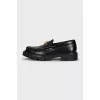 Leather loafers with gold logo