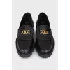 Leather loafers with gold logo