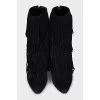 Black ankle boots with fringe