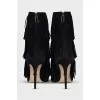Black ankle boots with fringe