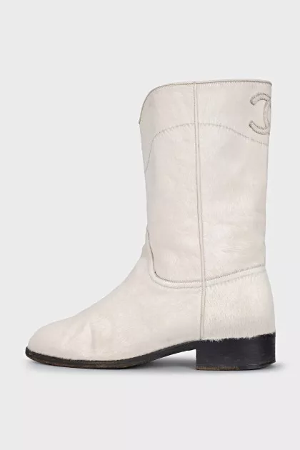 Logo-embossed shaggy leather boots