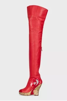 Leather over-the-knee boots with a gold wedge heel