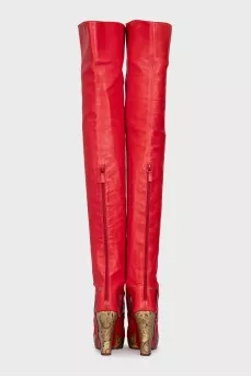 Leather over-the-knee boots with a gold wedge heel