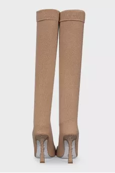 Textile boots with shiny soles