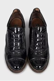 Patent leather shoes with stacked heels