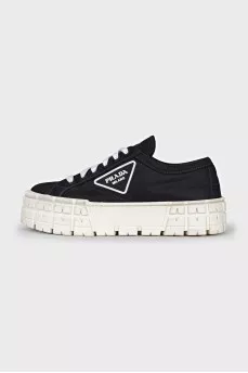 High-top sneakers with a logo