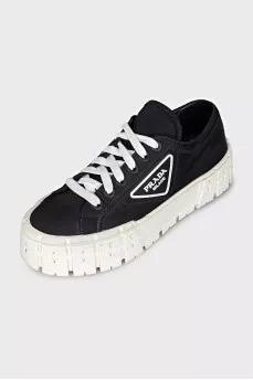 High-top sneakers with a logo